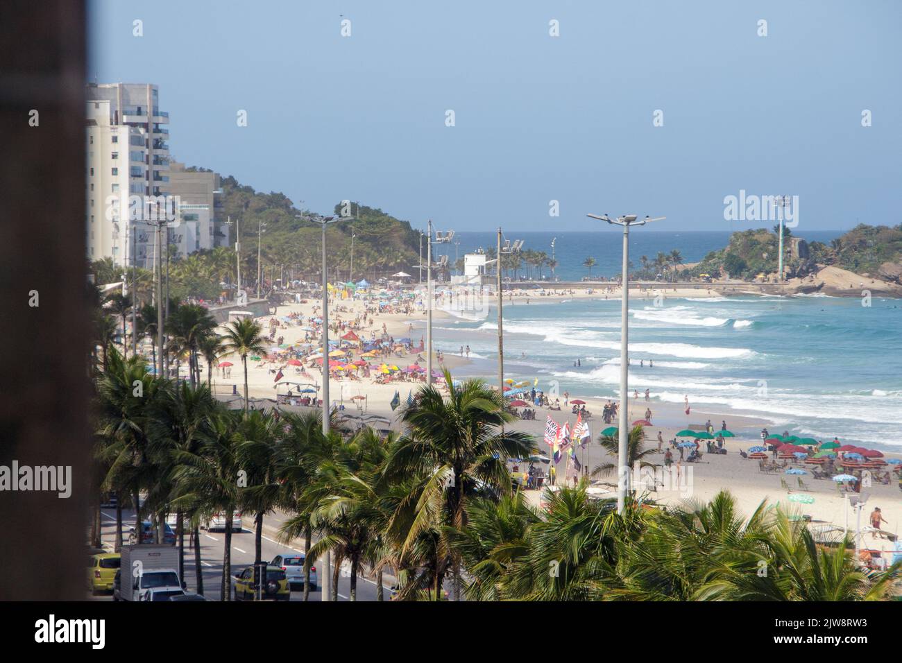 Ipanema beach in Rio de Janeiro, Brazil - October 25, 2022: Ipanema beach full in a beautiful sunny day in Rio de Janeiro. Stock Photo