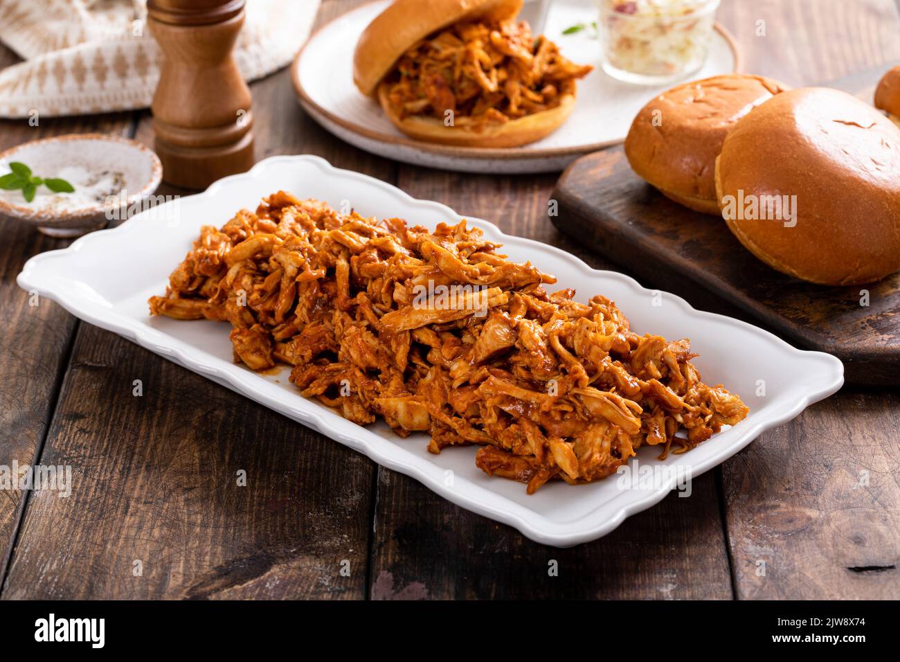 Pulled bbq chicken on a serving plate Stock Photo