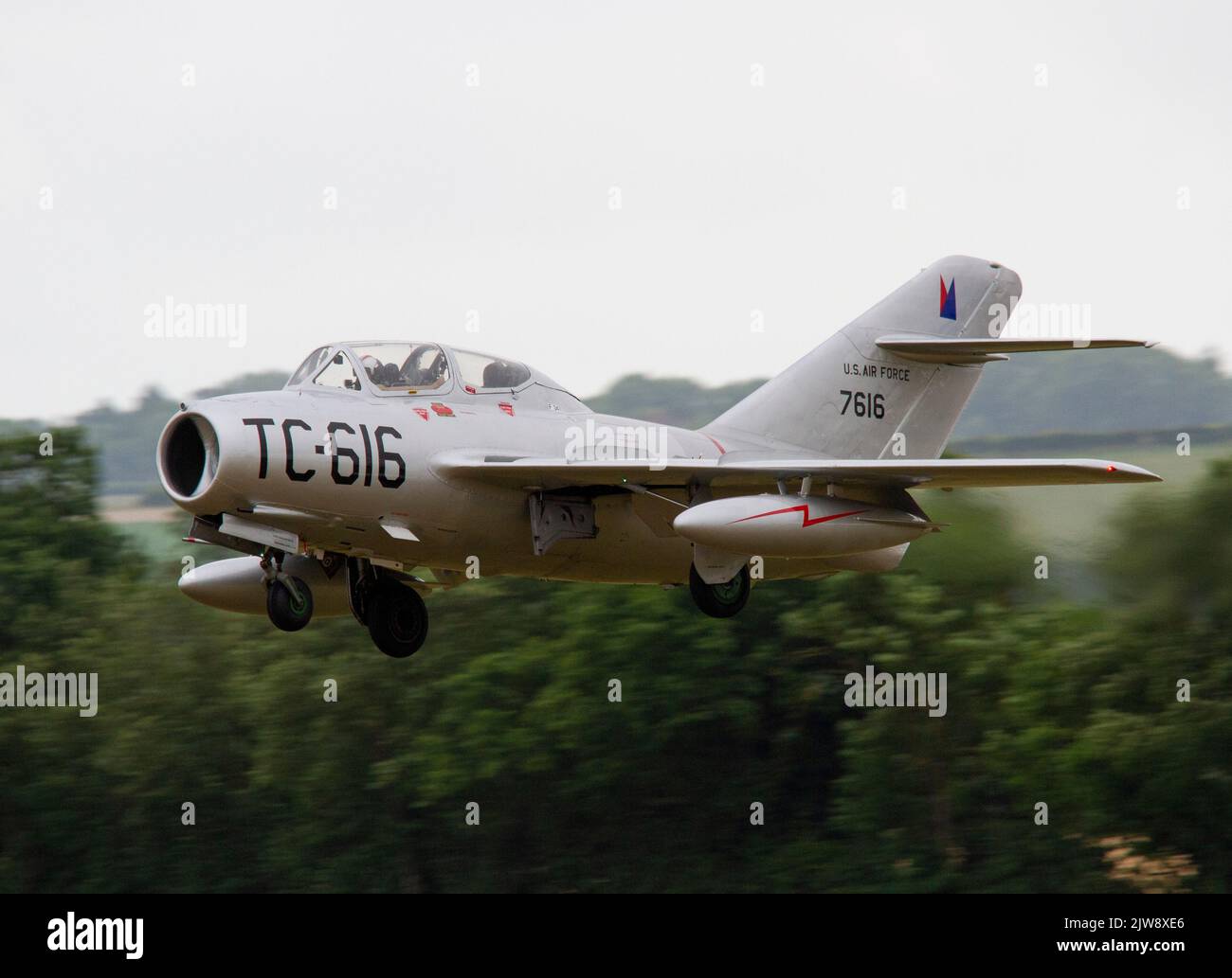Mikoyan-Gurevich MIG 15 landing on runway 24 at the Duxford Summer Airshow 23rd July 2022 Stock Photo
