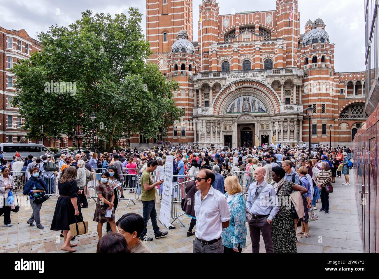 London, UK. 3rd September 2022, Religious devotees queue outside Westminster Cathedral to view the relics of St. Bernadette for the first time in the UK during a tour of England, Scotland and Wales throughout September and October 2022. Stock Photo