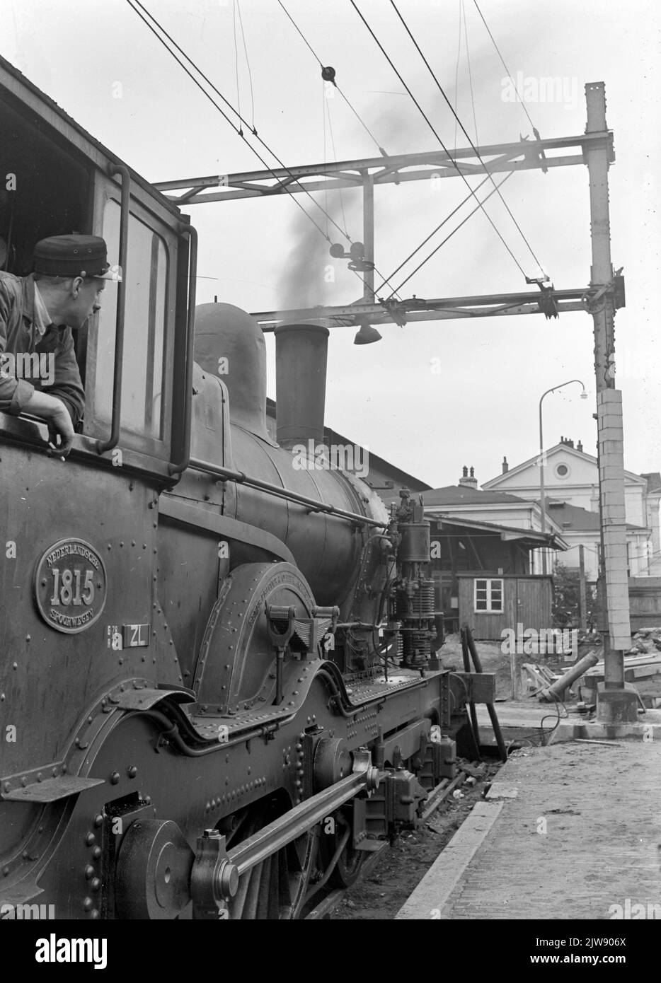 Image of a part of the steam locomotive No. 1815 (series 1700/1800) of the N.S. Along the platform of the N.S. station Zwolle in Zwolle. Stock Photo