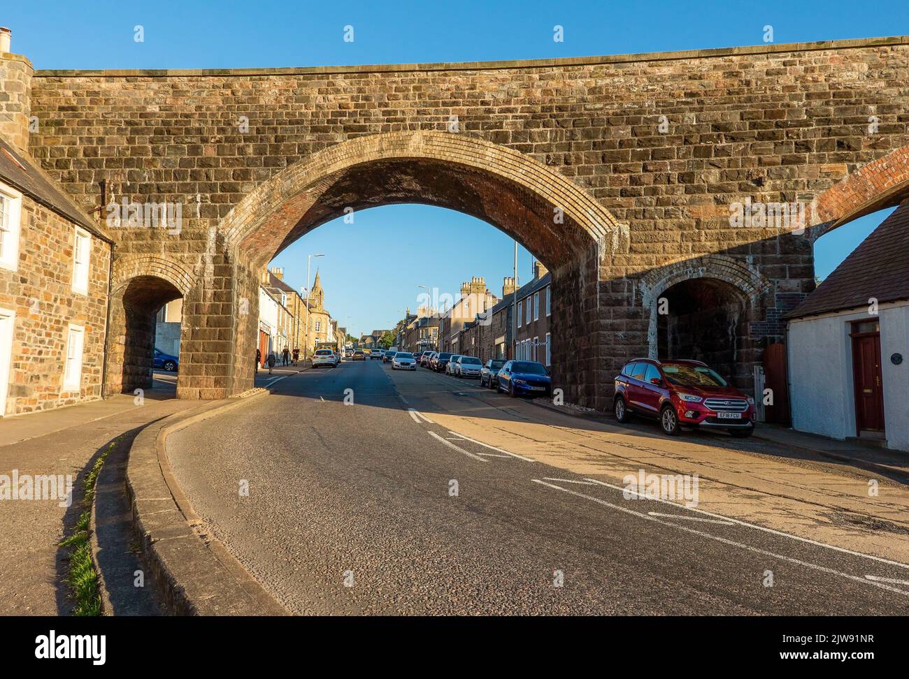 Arch of a disused railway line leading into the town of Cullen, Moray, Scotland, UK Stock Photo