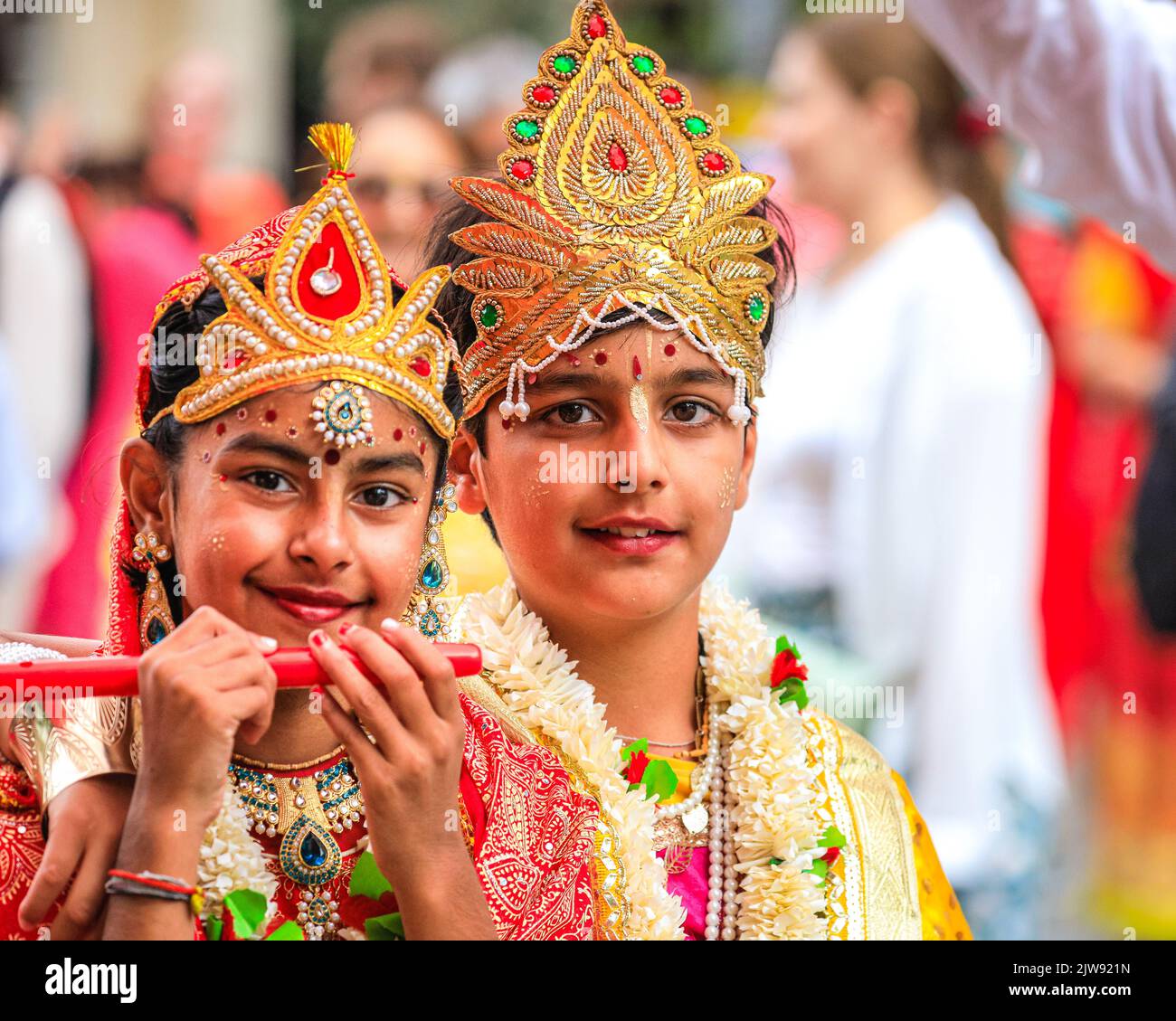 London, UK. 04th Aug, 2022. Two children at the start of the procession represent deities. The Hindu Ratha Yatra Festival (alternative spelling Rathayatra), or Chariot Festival, falls on the 4th of September this year and is celebrated in London with a procession of the chariots and deities from Hyde Park to Trafalgar Square, accompanied by the public, followed festivities, free food and performances in Trafalgar Square. Credit: Imageplotter/Alamy Live News Stock Photo