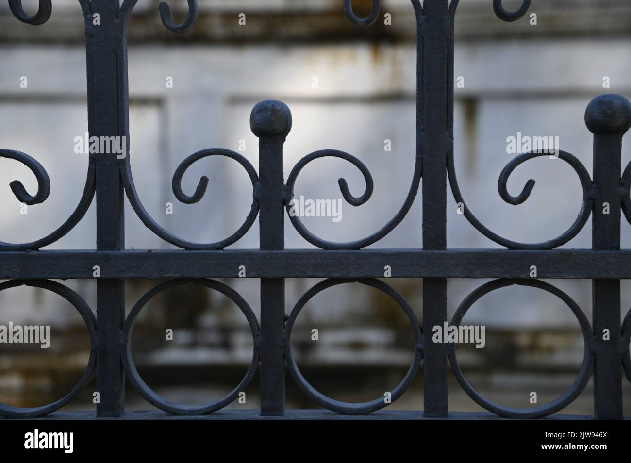Antique handcrafted wrought iron entrance gate railing in the historic ...