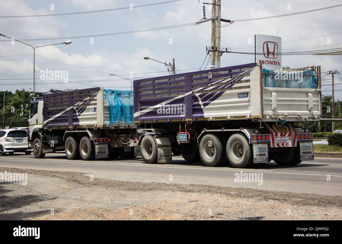 Chiangmai, Thailand -  June  13 2022: Private Isuzu Dump Truck. On road no.1001 8 km from Chiangmai Business Area. Stock Photo