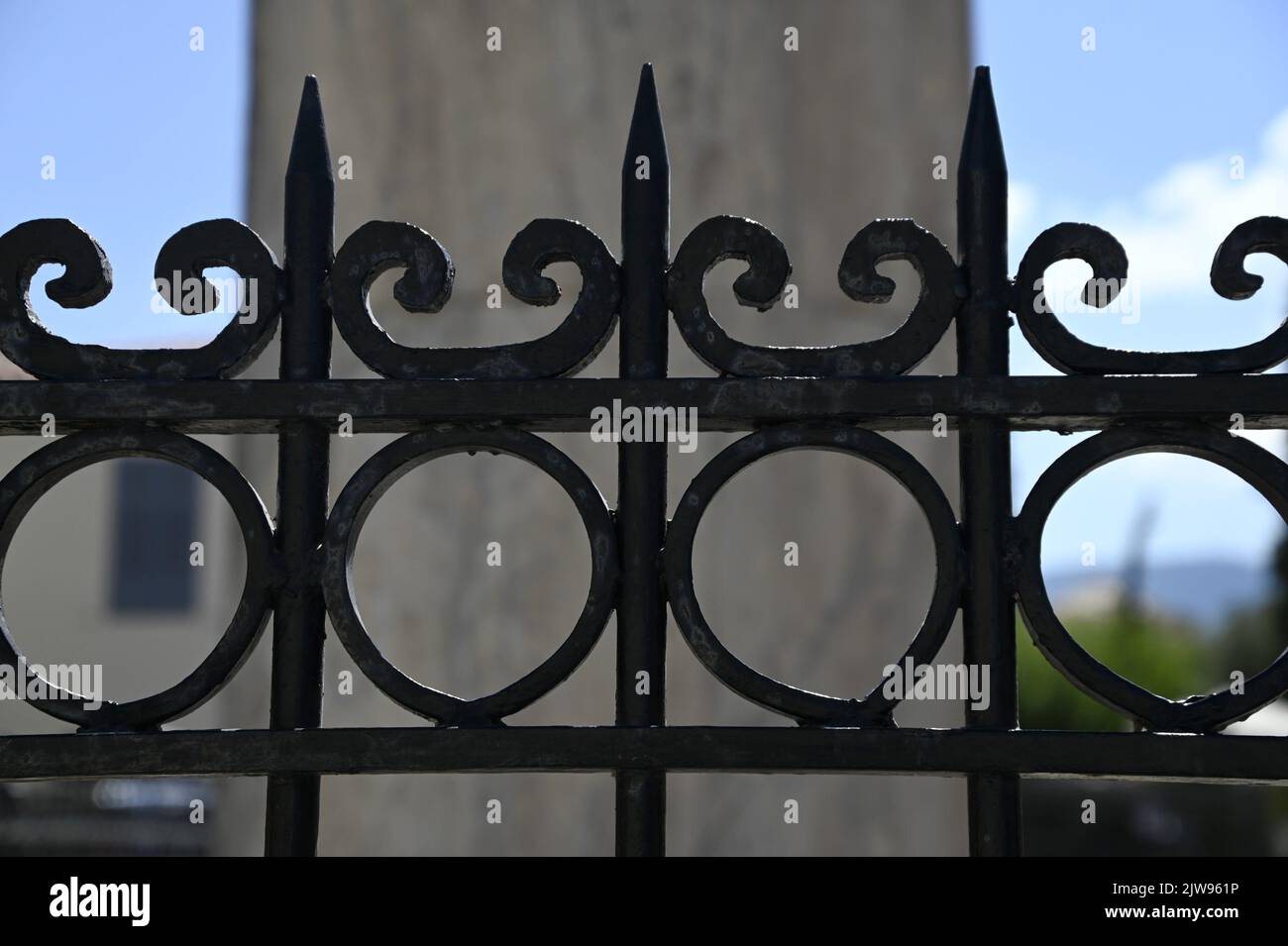 Antique handcrafted wrought iron entrance gate railing in the historic ...