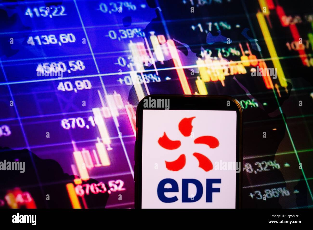 KONSKIE, POLAND - August 30, 2022: Smartphone displaying logo of EDF (Electricite de France) company on stock exchange diagram background Stock Photo