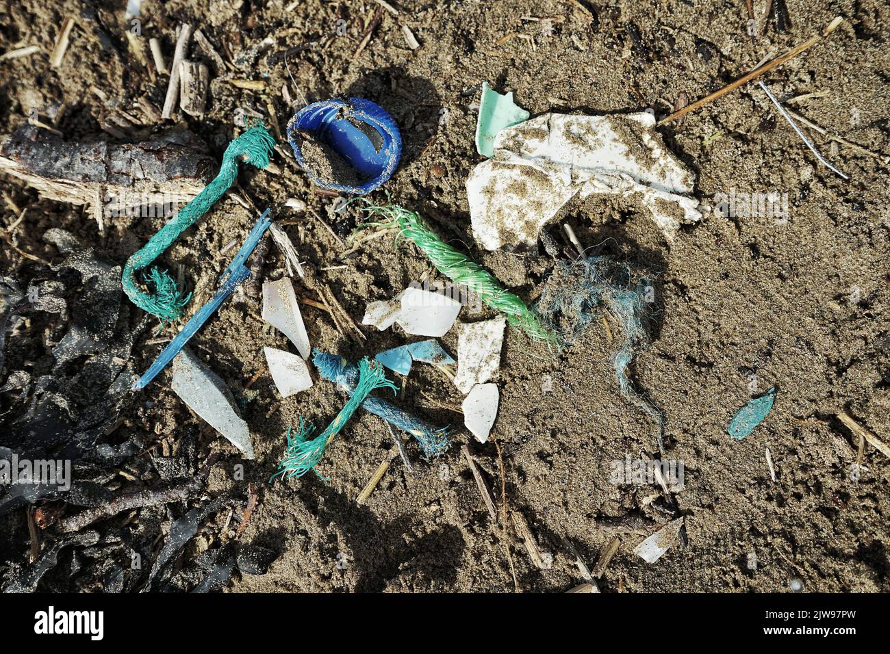 Plastics on the beach Stock Photo
