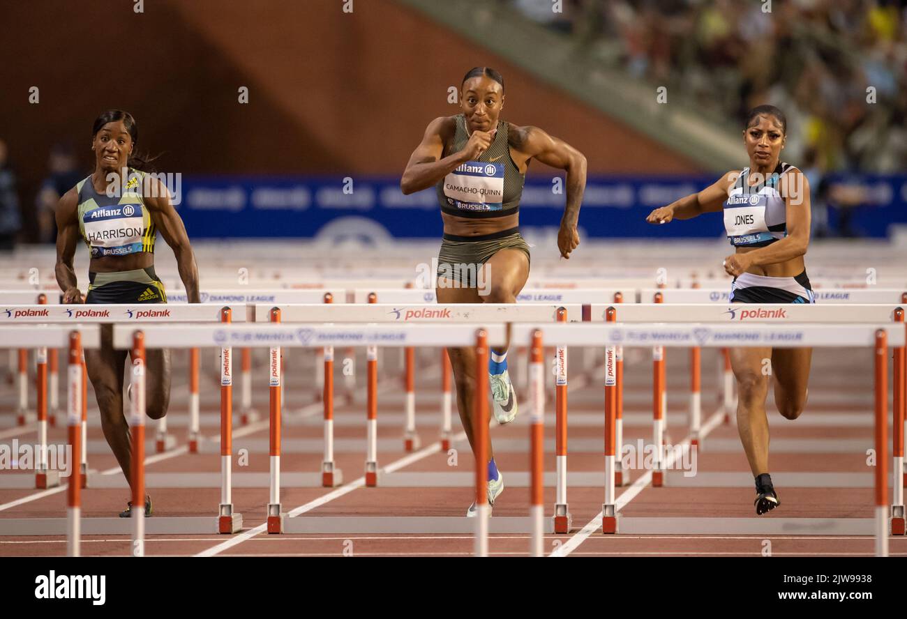 Kendra Harrison, Jasmine CamachoQuinn and Tia Jones competing in the