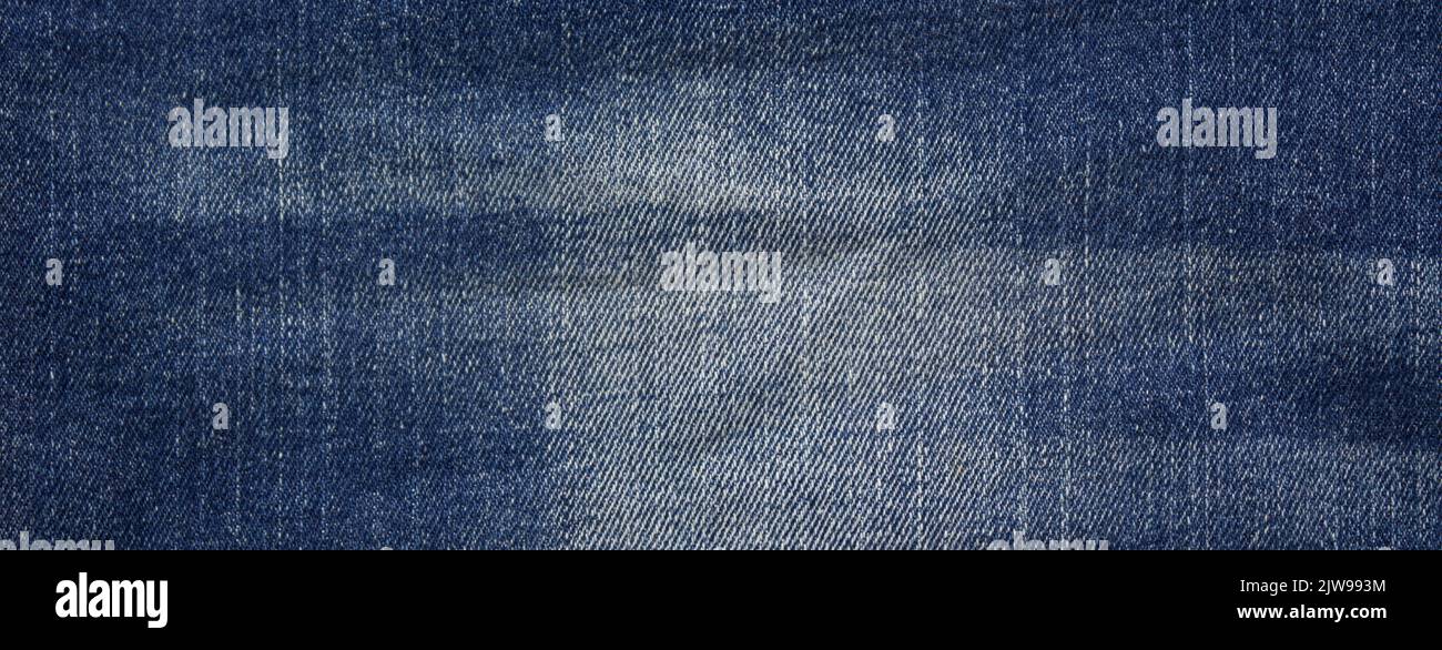 Photo of dark blue jeans fabric, detailed denim background, texture Stock Photo