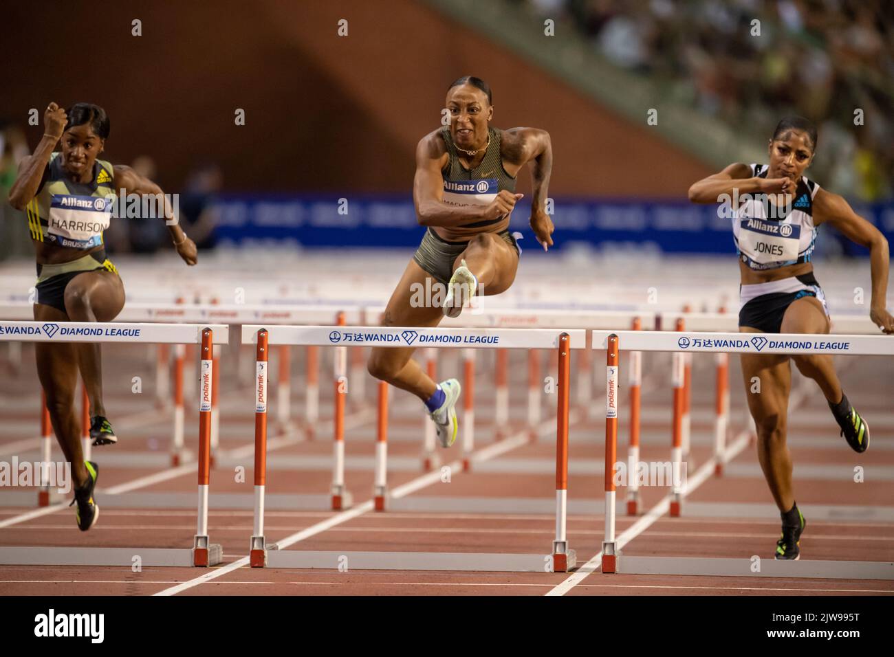 Kendra Harrison, Jasmine CamachoQuinn and Tia Jones competing in the