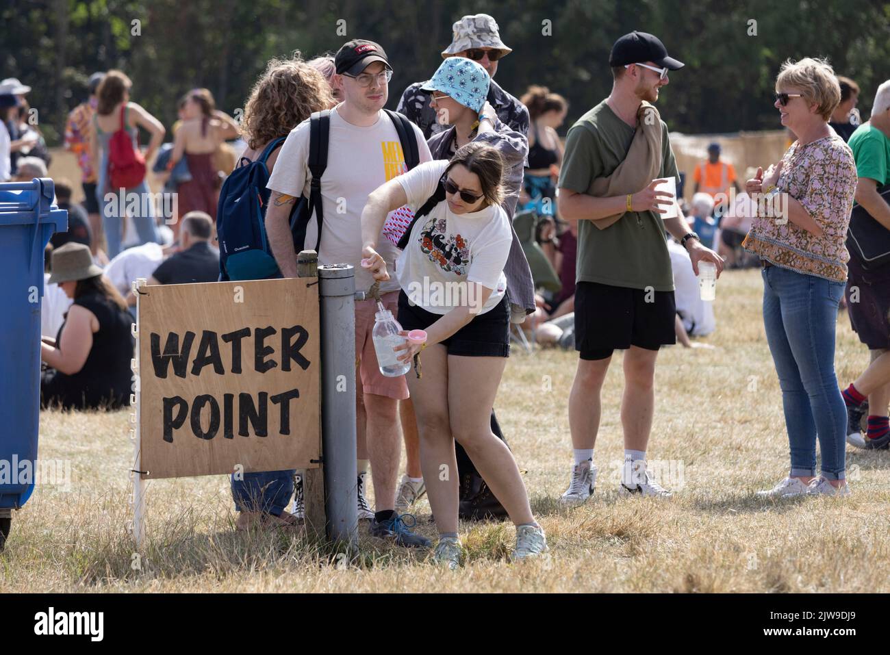 Festival goers stock up on water at END OF THE ROAD music festival, held at Larmer Tree Gardens, Wiltshire, England, UK Stock Photo