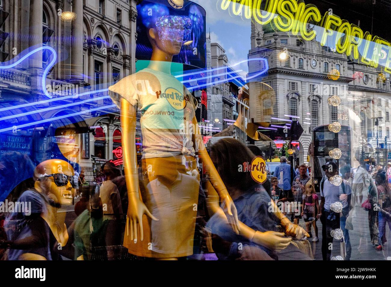 Street reflections in window of Hard Rock Cafe, Piccadilly Circus, London, UK. Stock Photo