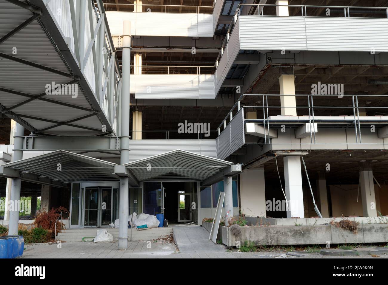 Entrance of a vacant derelict commercial building Stock Photo