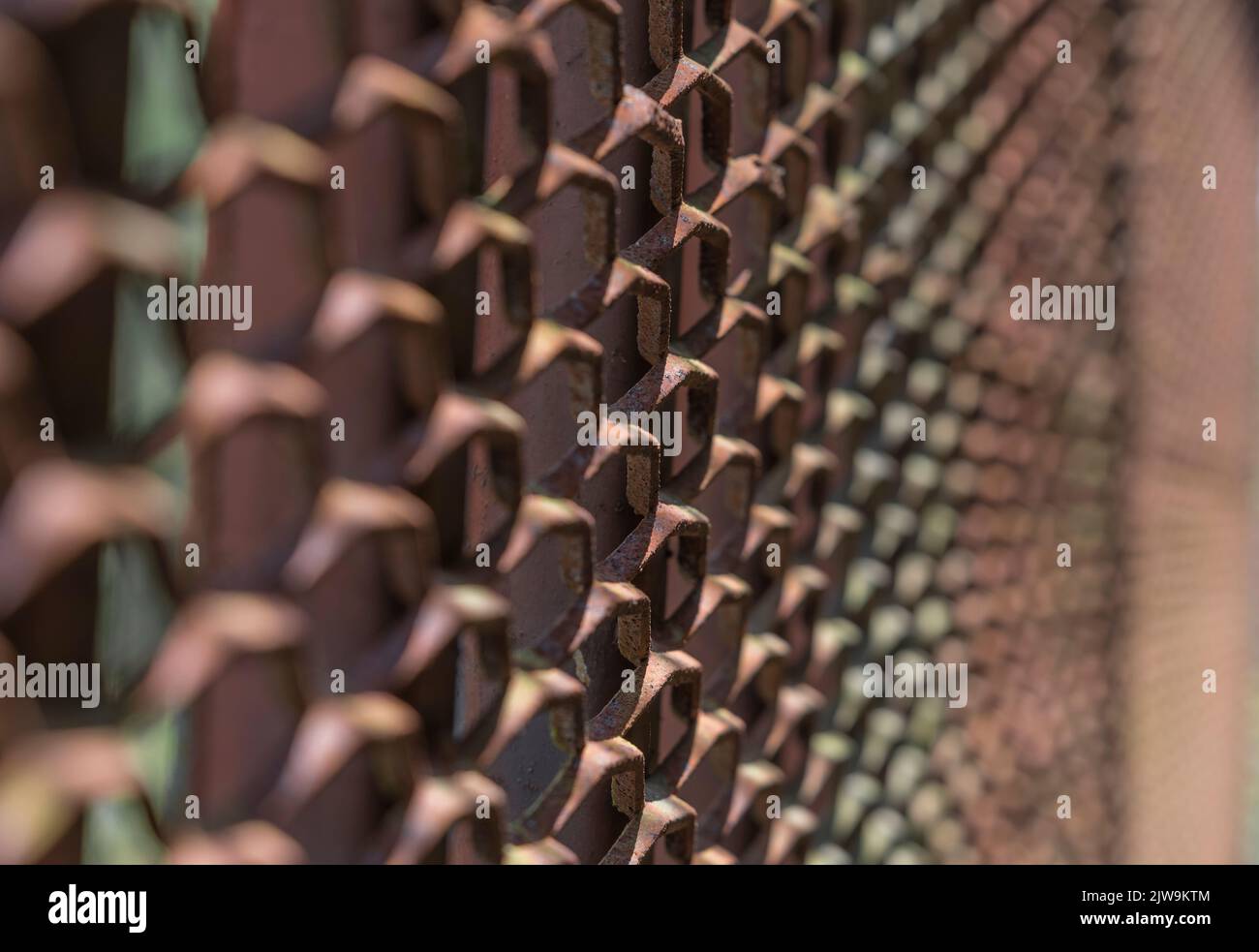 detail of a rusty steel grid fence Stock Photo - Alamy