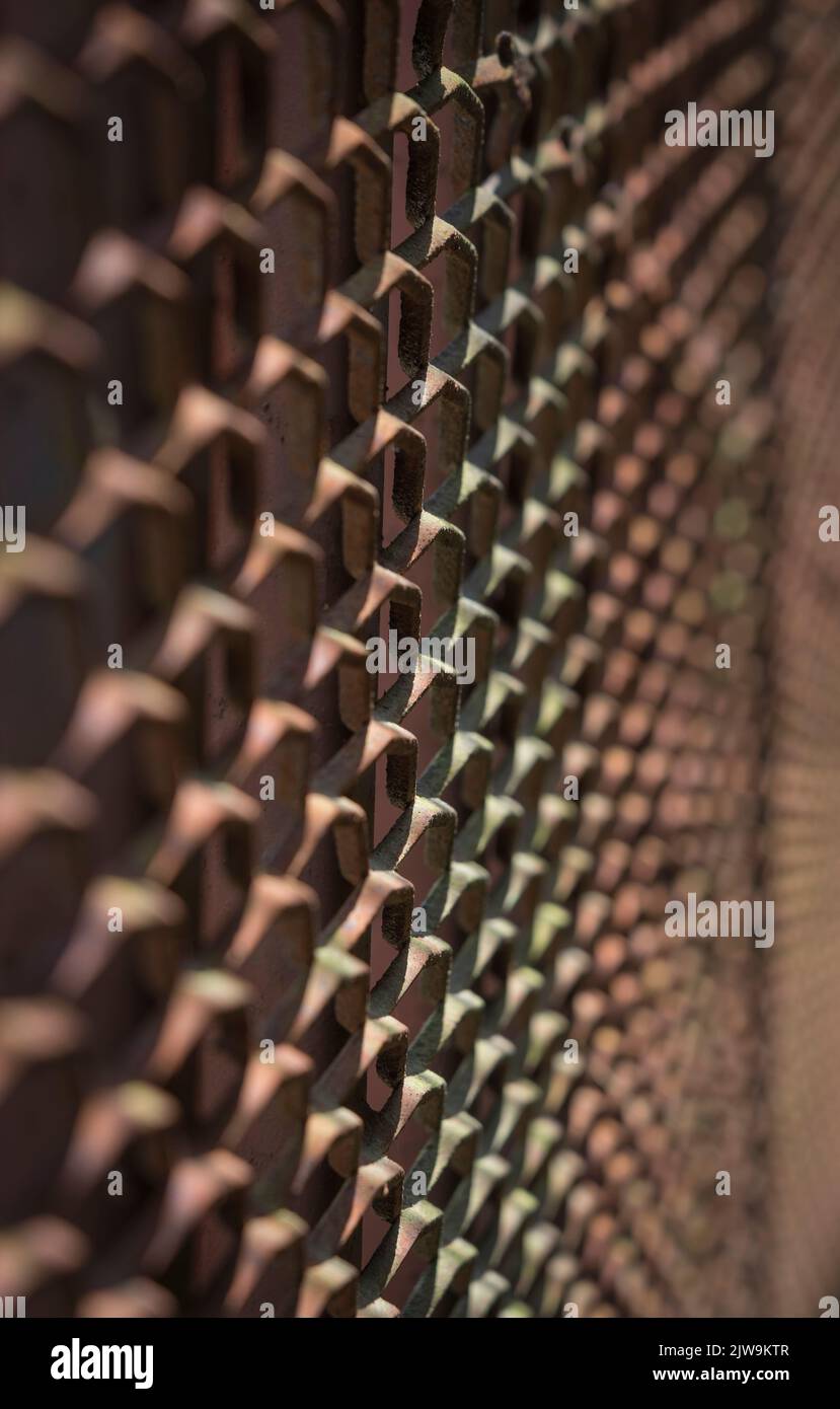 detail of a rusty steel grid fence Stock Photo - Alamy
