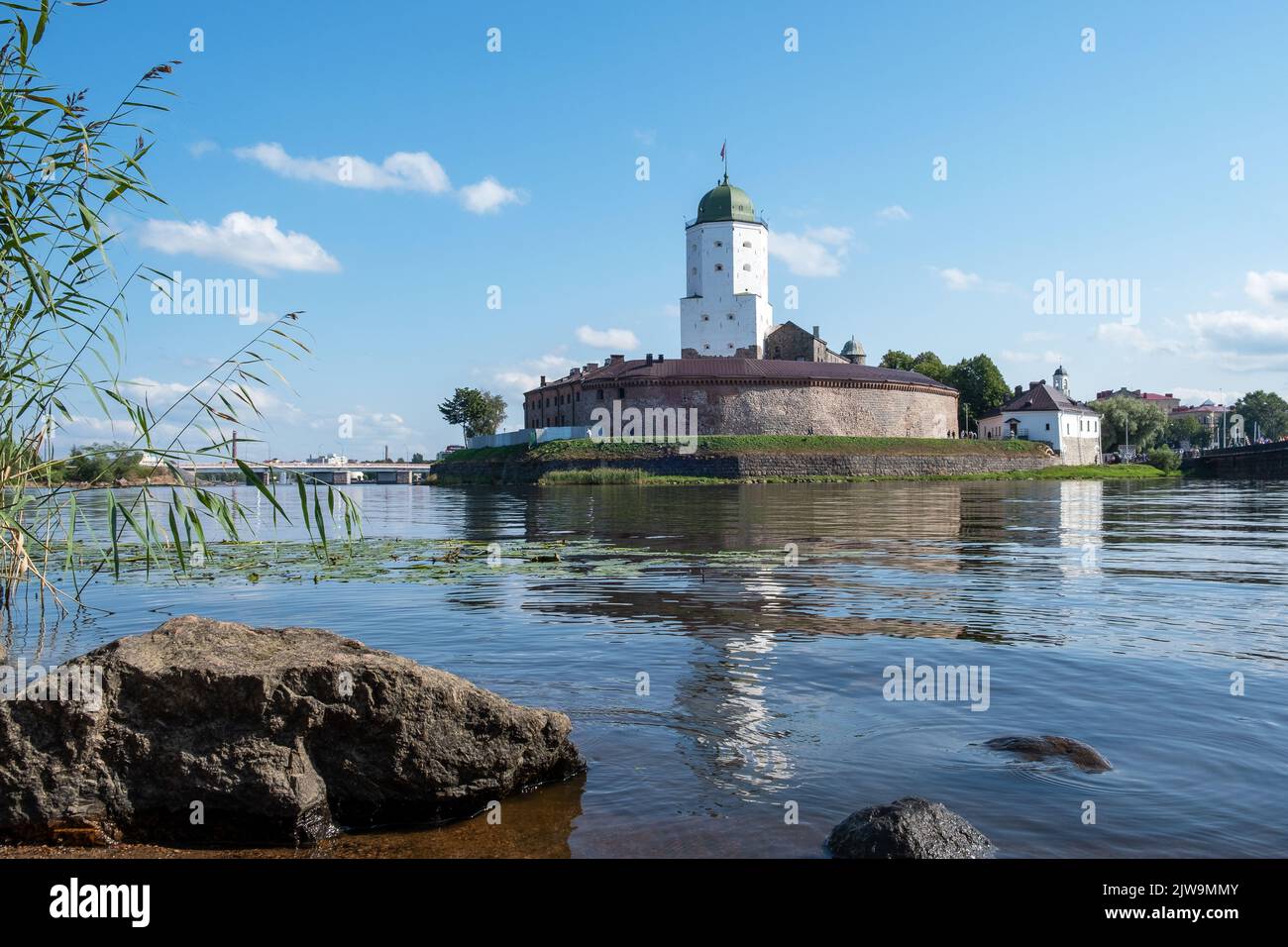Vyborg, Leningrad region, Russia. - August 27, 2022. View of the medieval knight's castle from the city embankment. Selective focus. Stock Photo
