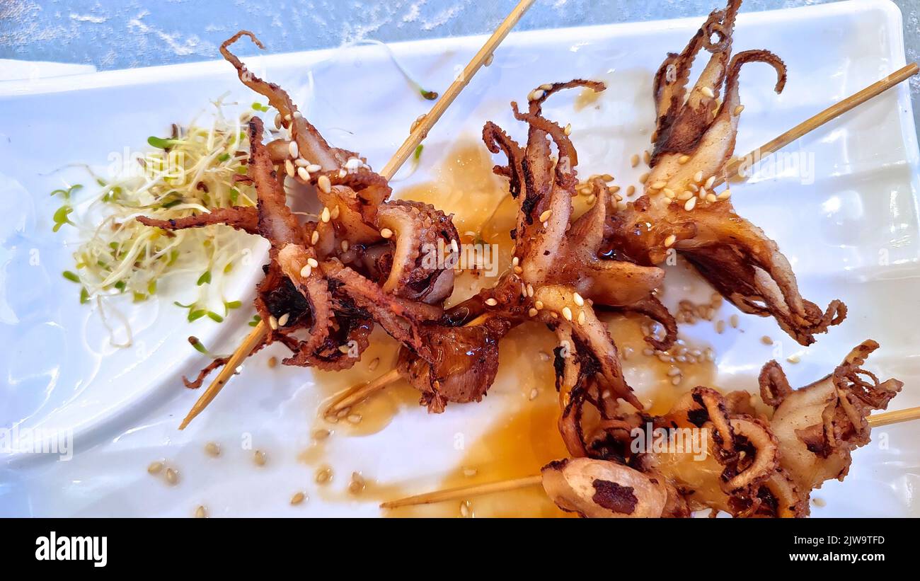 Chinese style BBQ octopus with soy sauce Stock Photo