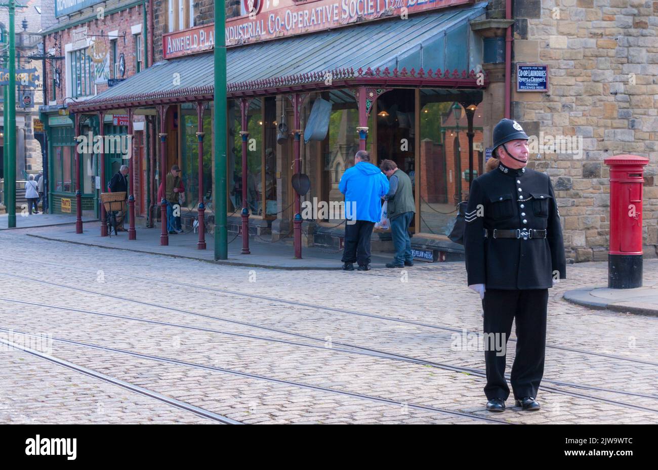 A  man dressed as a Police officer in the streets at Beamish Museum, England,UK Stock Photo
