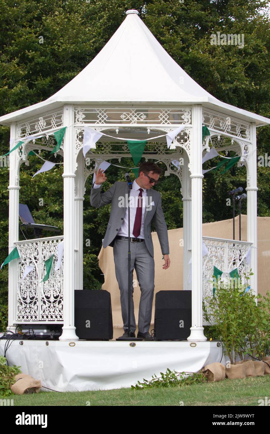 Chris Weeks, jazz singer, performing at the inaugural Gardeners World Autumn Fair 2022 held at Audley End in Essex. Stock Photo