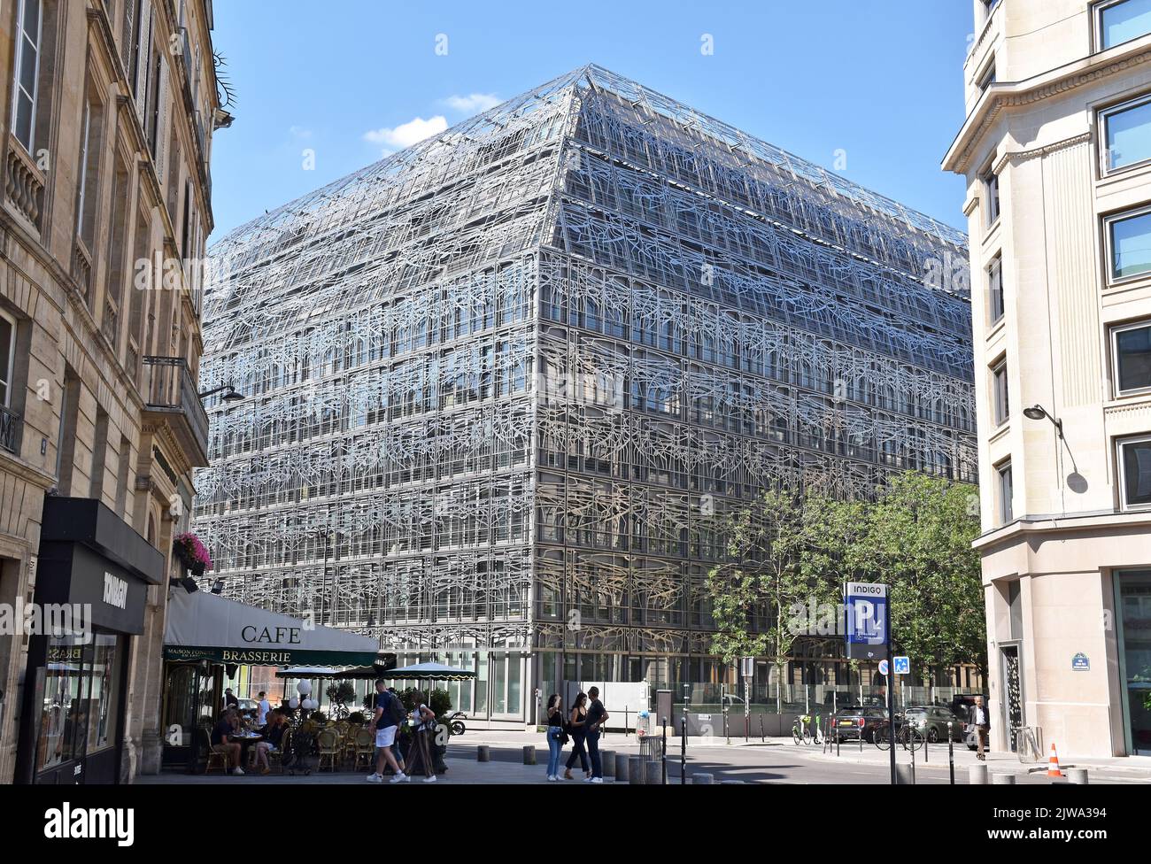Buildings in an entire Paris street block covered with a metal framework, of filigree steel strips in abstract arabesque patterns on all upper floors Stock Photo