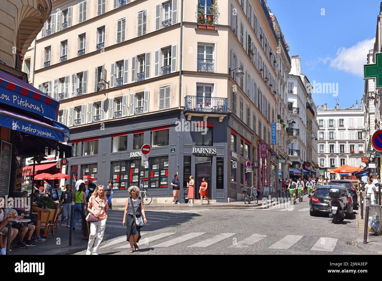Paris, France, the junction of r. des Martyrs & r. des Abbesses on the slope of Montmarte, a particularly lively area with restaurants and good shops Stock Photo