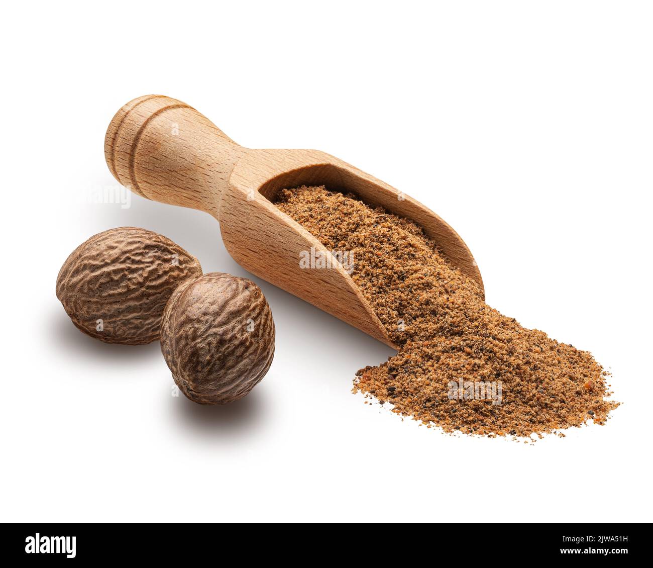 Nutmeg powder in a wooden scoop isolated on white Stock Photo