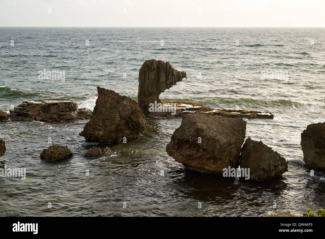 The big rocks in the sea on a sunny day Stock Photo - Alamy
