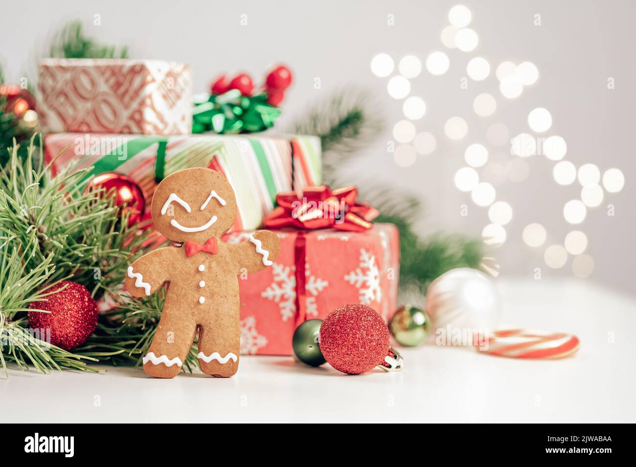 Christmas Decorations with Gingerbread man and Gift Box Stock Photo