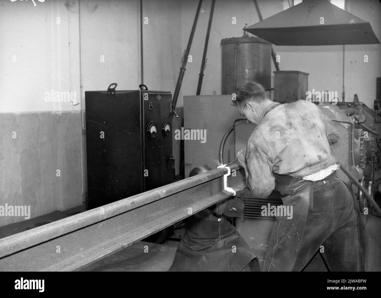 Image of an employee of the rail lashing (SLI) of the N.S. in Utrecht while breaking down a weld. Stock Photo