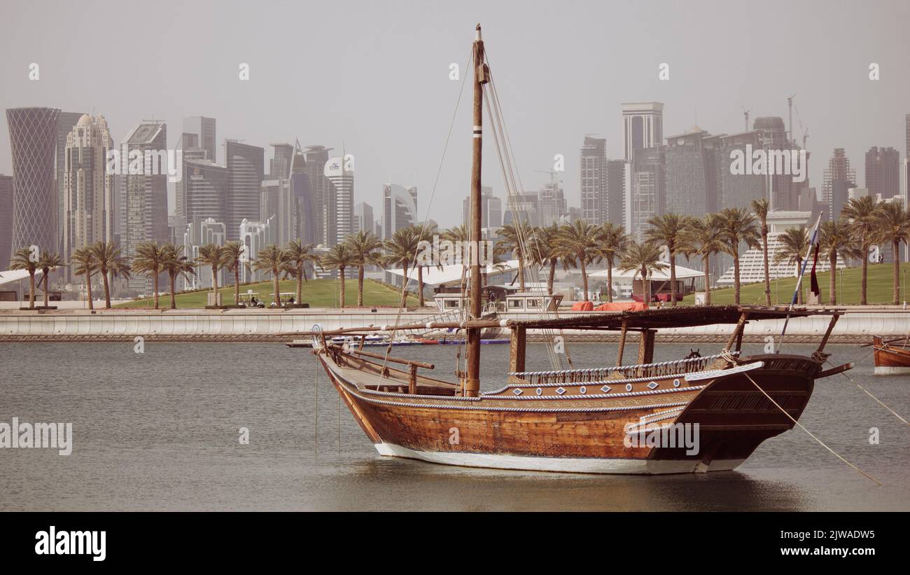 Traditional Fishing boats called dhow at the Qatar Corniche Stock Photo