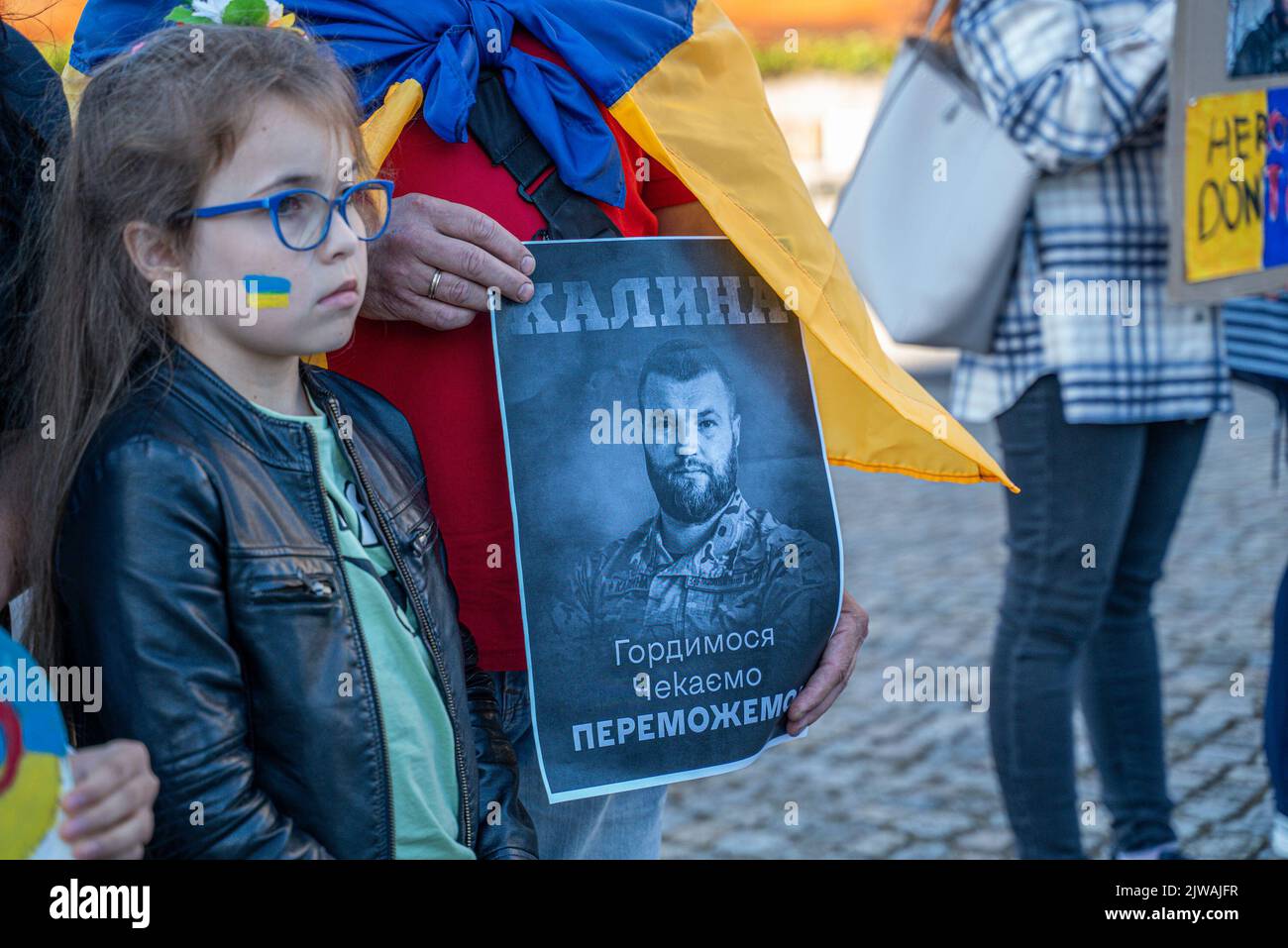 Gdansk, Poland. 04th Sep, 2022. A protester holds a picture of an Azovstal Defender in Russian Captivity during the rally. In support of Ukraine, defenders and military prisoners, a rally was organised to draw attention to the crimes that Russia commits in Ukraine. There is a war going on in Ukraine and civilian people and army are dying every day. Credit: SOPA Images Limited/Alamy Live News Stock Photo