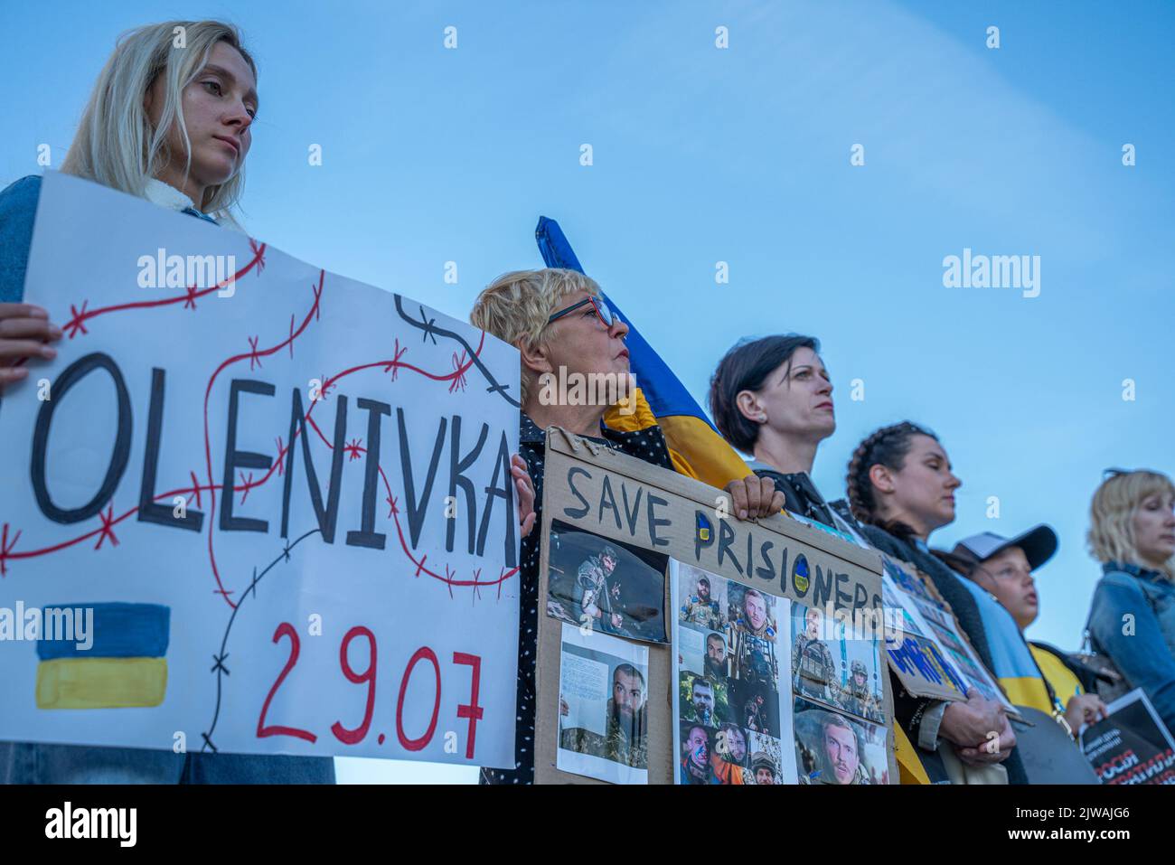 Gdansk, Poland. 04th Sep, 2022. A protester holds pictures of Azovstal Defenders in Russian Captivity during the rally. In support of Ukraine, defenders and military prisoners, a rally was organised to draw attention to the crimes that Russia commits in Ukraine. There is a war going on in Ukraine and civilian people and army are dying every day. Credit: SOPA Images Limited/Alamy Live News Stock Photo