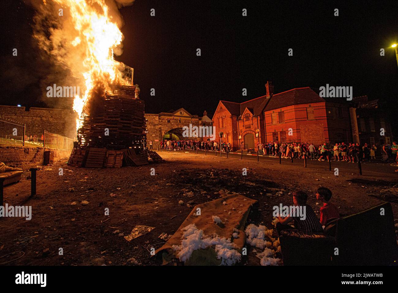 Loyalist bonfire in the protestant Fountain Estate, Derry, Londonderry, Northern Ireland . Stock Photo