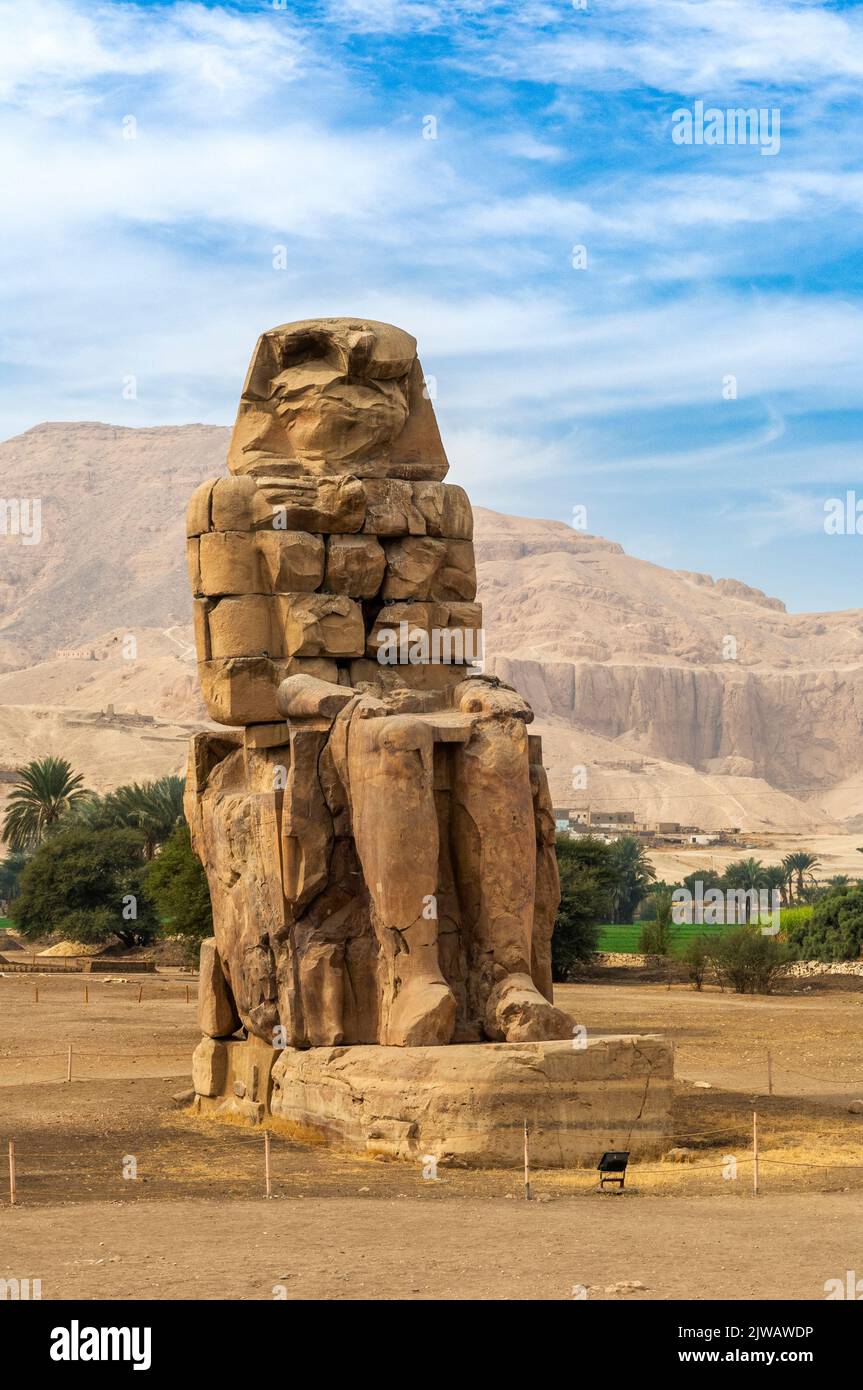 One of the Colossi of Memnon, West bank of the Nile, Thebes, Egypt Stock Photo