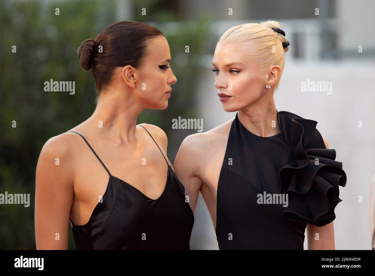 Irina Shayk And Stella Maxwell attend the "L'Immensita" red carpet at