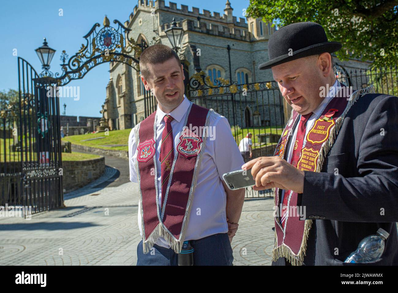 Members of the loyalist Apprentice Boys of Derry leaving a service at St Columb's Cathedral, Londonderry Stock Photo