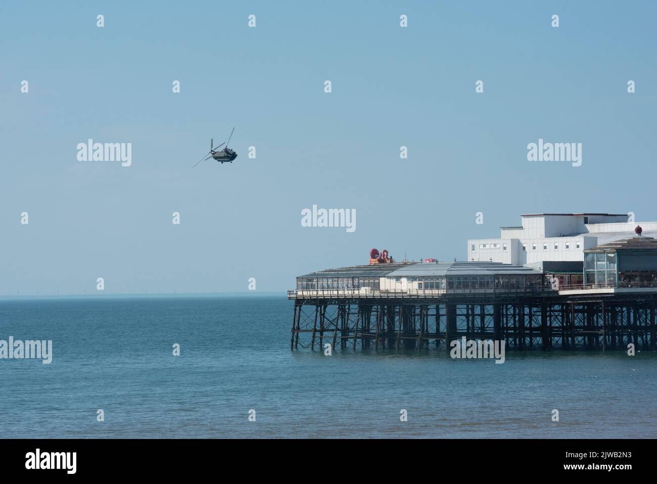 A Chinook flying over North Pier in Blackpool as part of Blackpool Air Show, August 13th, 2022 Stock Photo