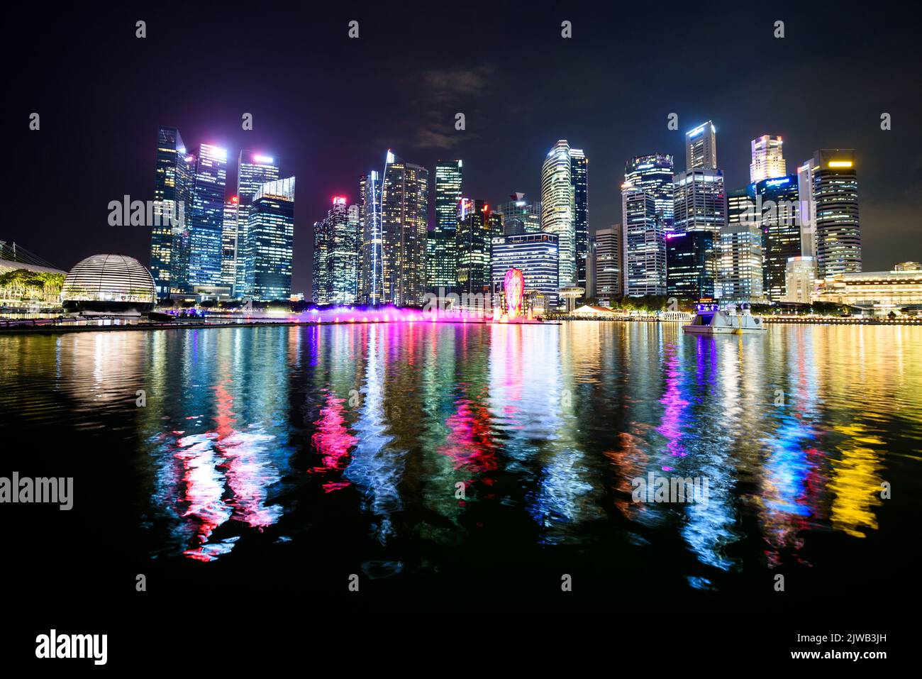 Night view of downtown skyscrapers at Marina Bay, Singapore Stock Photo