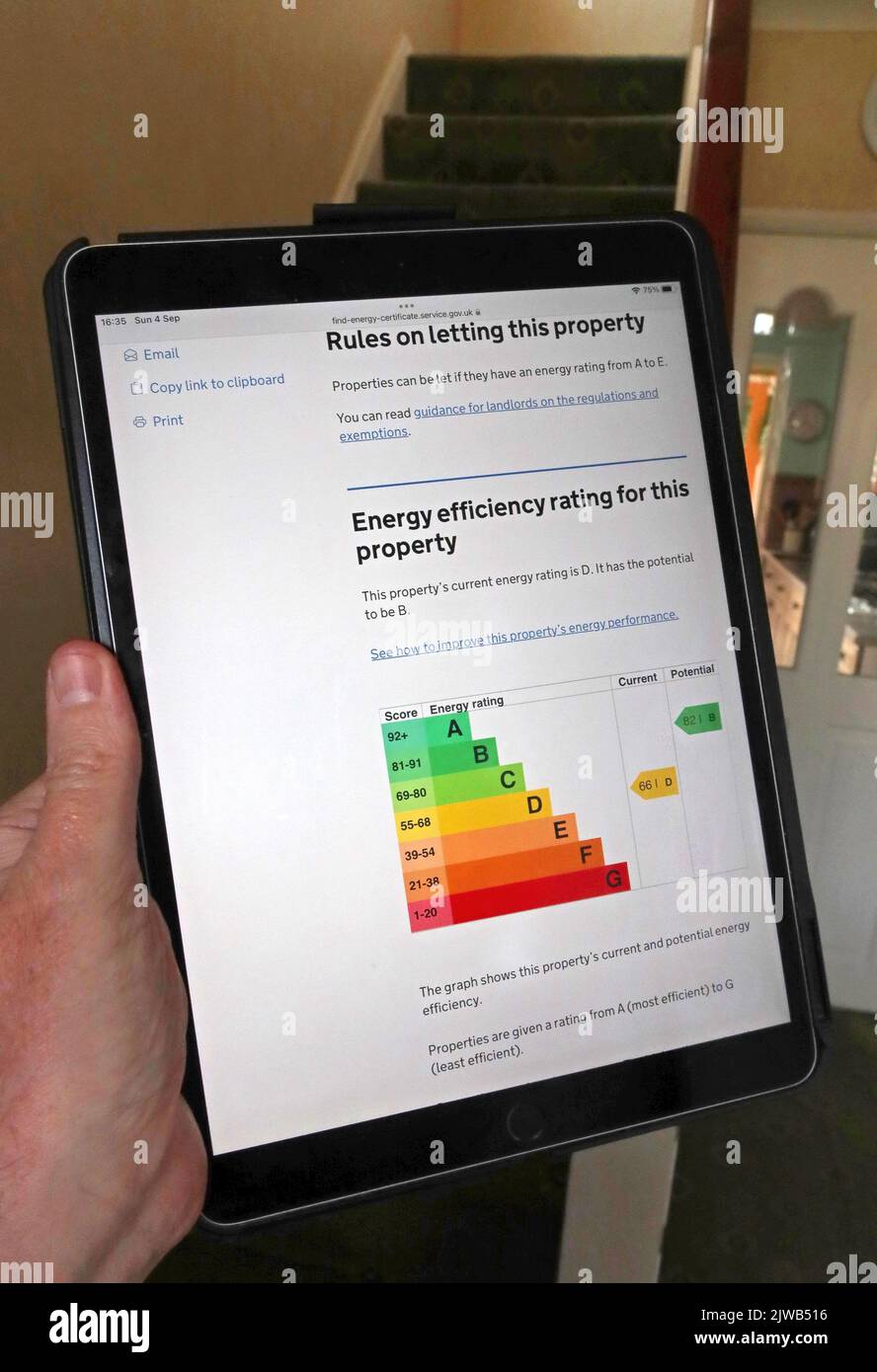 EPCs, Energy Performance Certificate,viewed online via an iPad, in a terraced house, 2025 deadline approaches for C rating Stock Photo