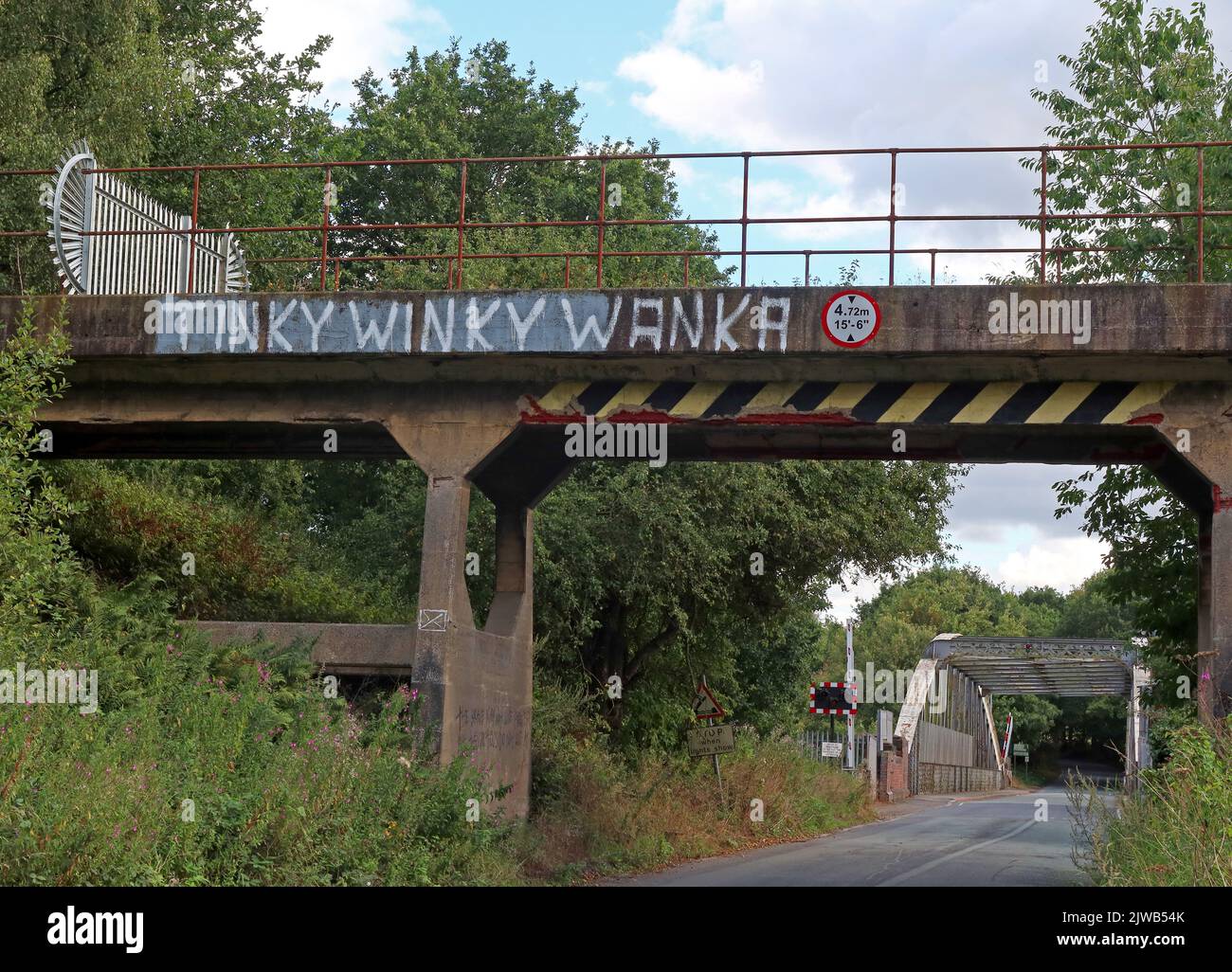 Port Warrington entrance, graffiti on bridge, Tinky Winky Wanka, Moore Ln, Warrington, Cheshire, England, UK, WA4 6T - Ocean Gateway Stock Photo