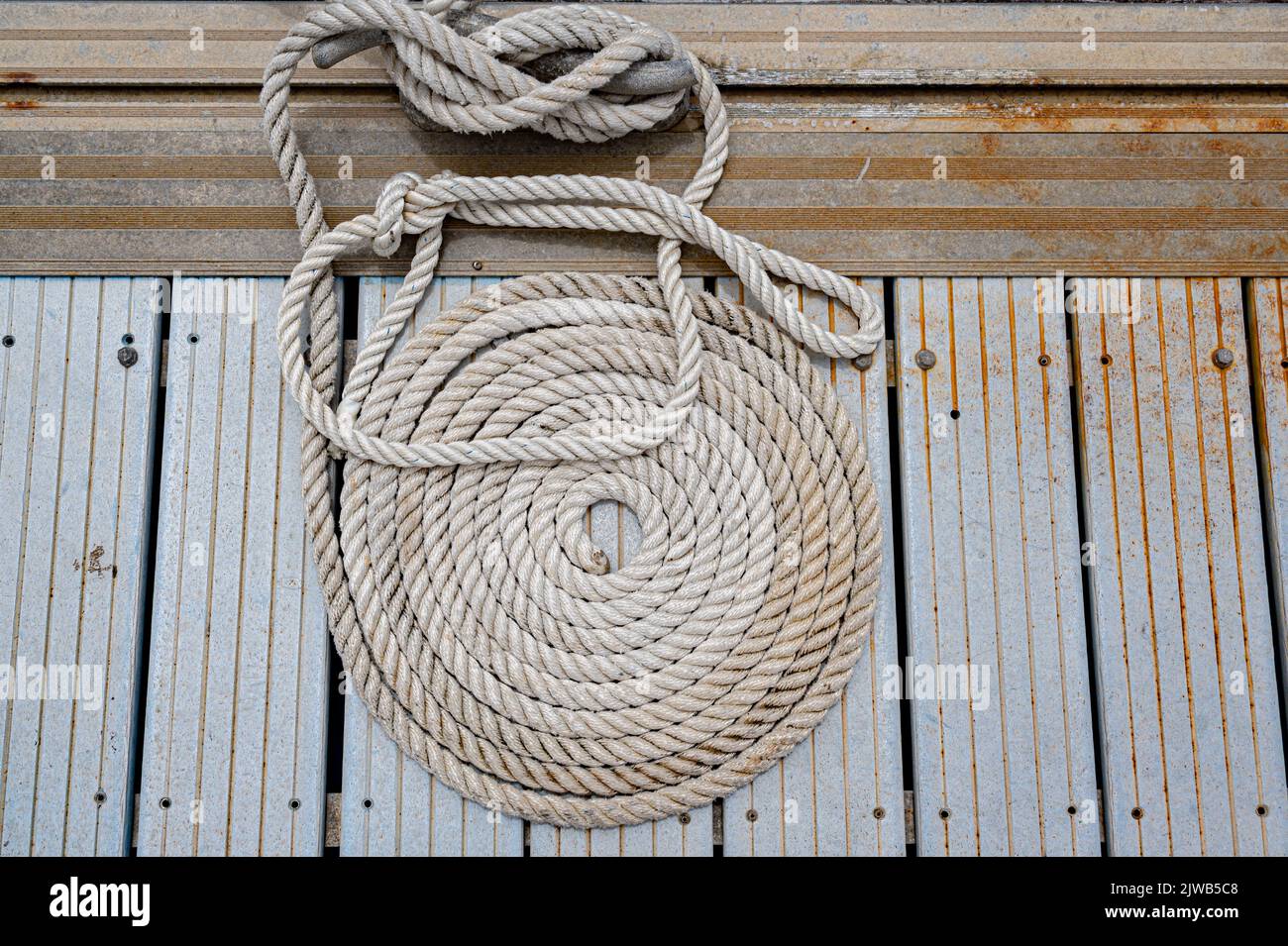 Coiled marine ropes on the quayside in Marigot, the capital of the ...