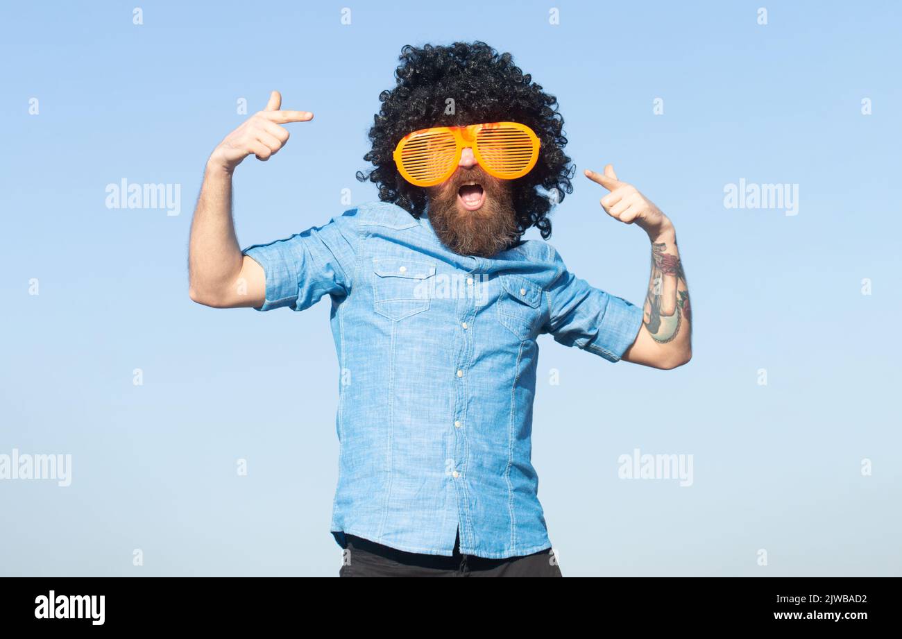 Funny man wig pointing finger hi-res stock photography and images - Alamy