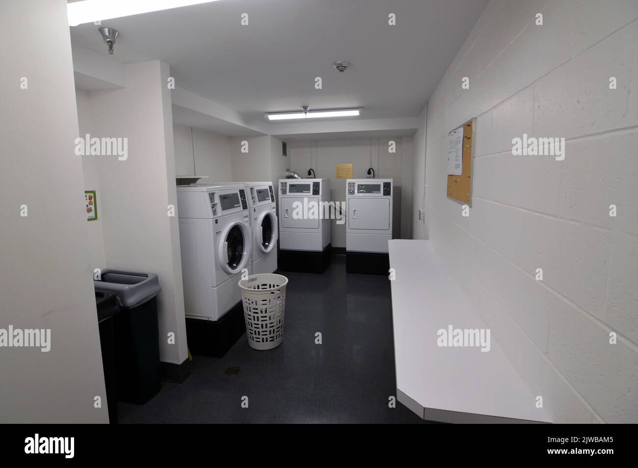 Communal laundry room of the Waterfront Place condominium building in Halifax, Nova Scotia Stock Photo