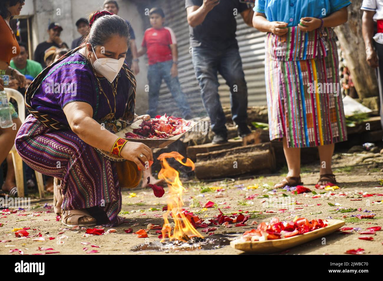 Sonsonate, El Salvador. 04th Sep, 2022. A woman prepares a sacred fire