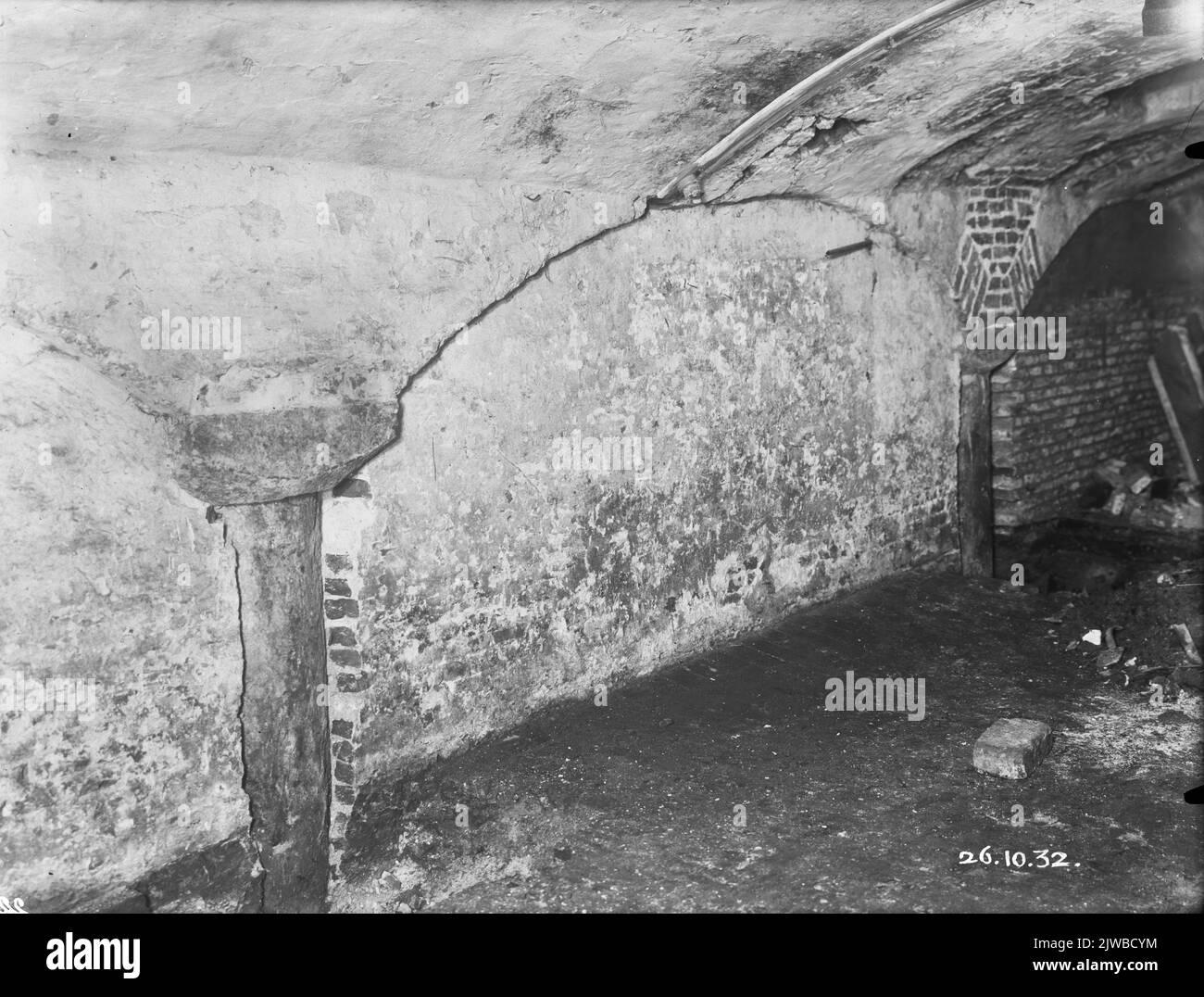 View of two sandstone columns with capitals and basements of Devonic limestone, present in the basement of Huizen Donkerstraat 1-5 in Utrecht. Stock Photo