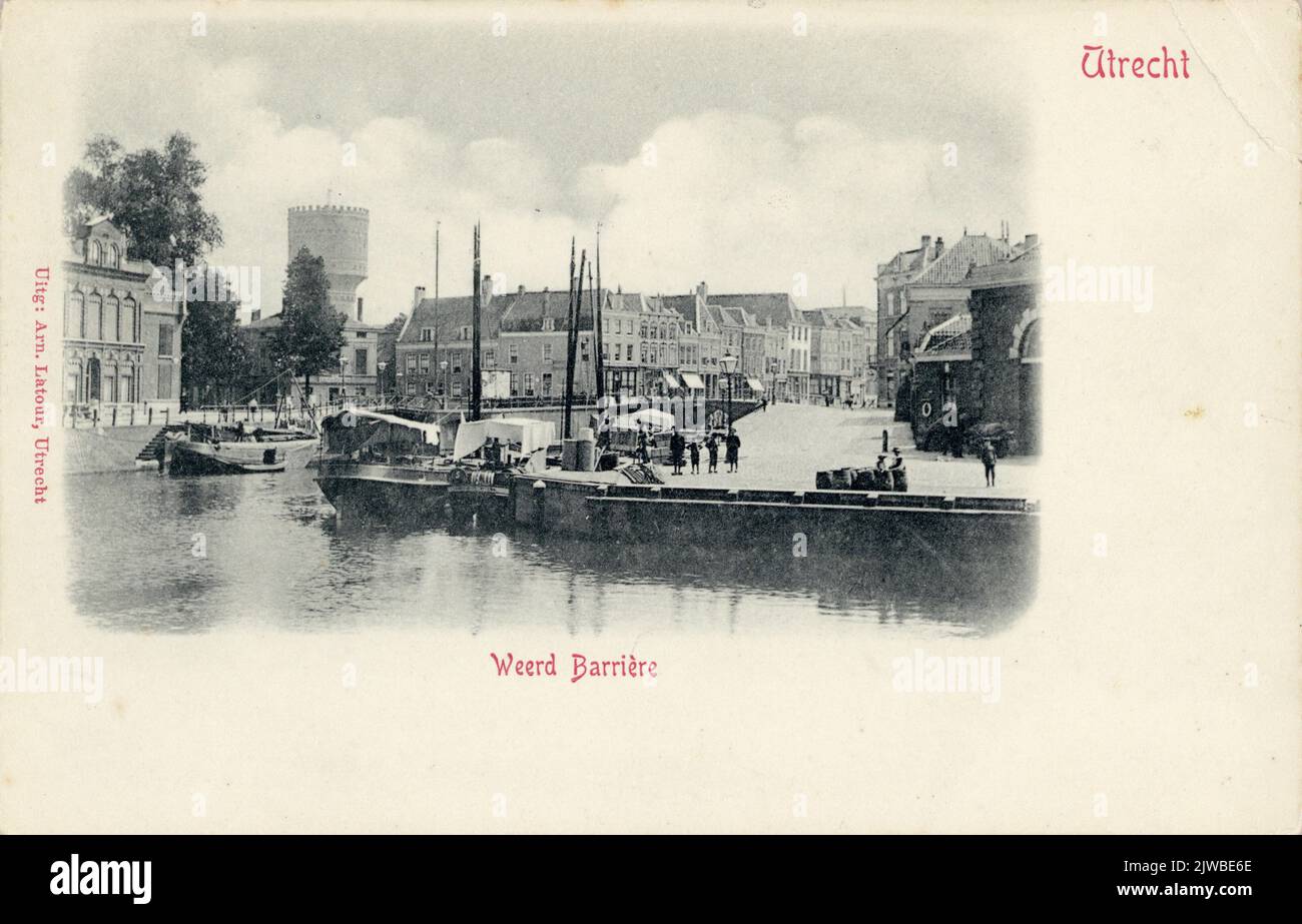 View of the Stadsbuitengracht in Utrecht with the Nieuwekade on the right and in the background (left) the water tower at the Prediherenkerkhof and (center) the Oudegracht Weerdzijde. Stock Photo