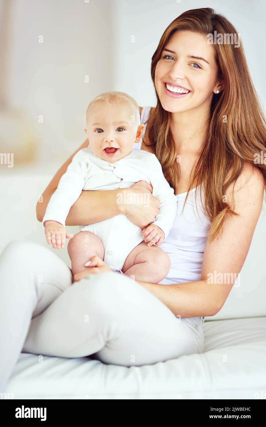 The most important little guy in my life. a young mother bonding with her adorable baby boy at home. Stock Photo