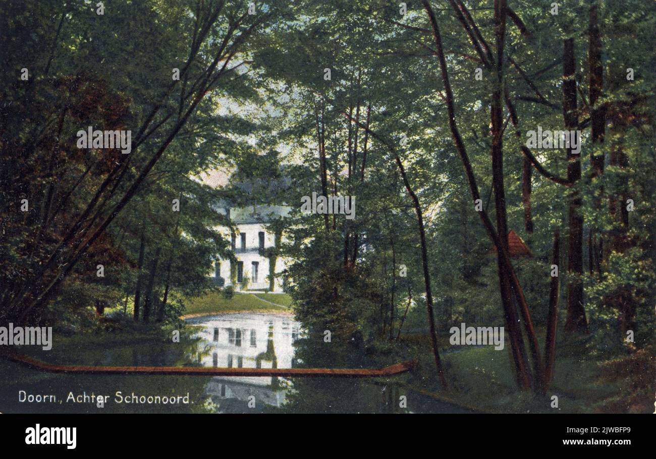 Face over the pond in the park of the Schoonoord country estate (Postweg 18) in Doorn from the southwest, with the left side of the house in the background. Stock Photo