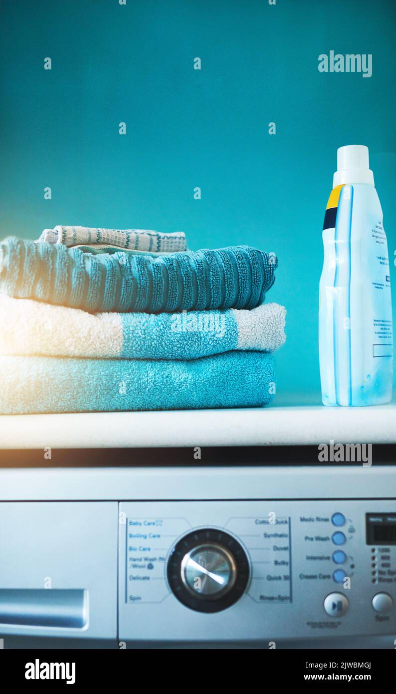 Looking and smelling fresh. clean linen in the laundry room Stock Photo
